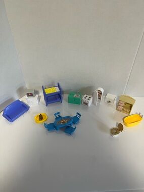 Lot / bundle of plastic dollhouse furniture